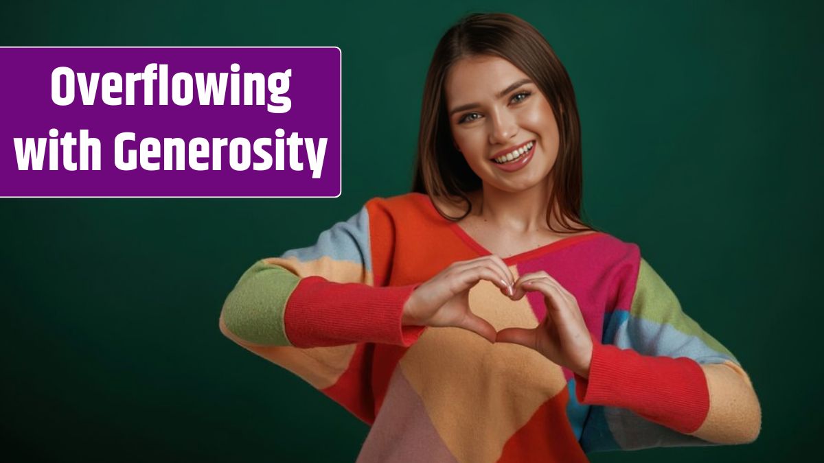 Gesture by hands sending love Young woman is standing against green background in the studio.