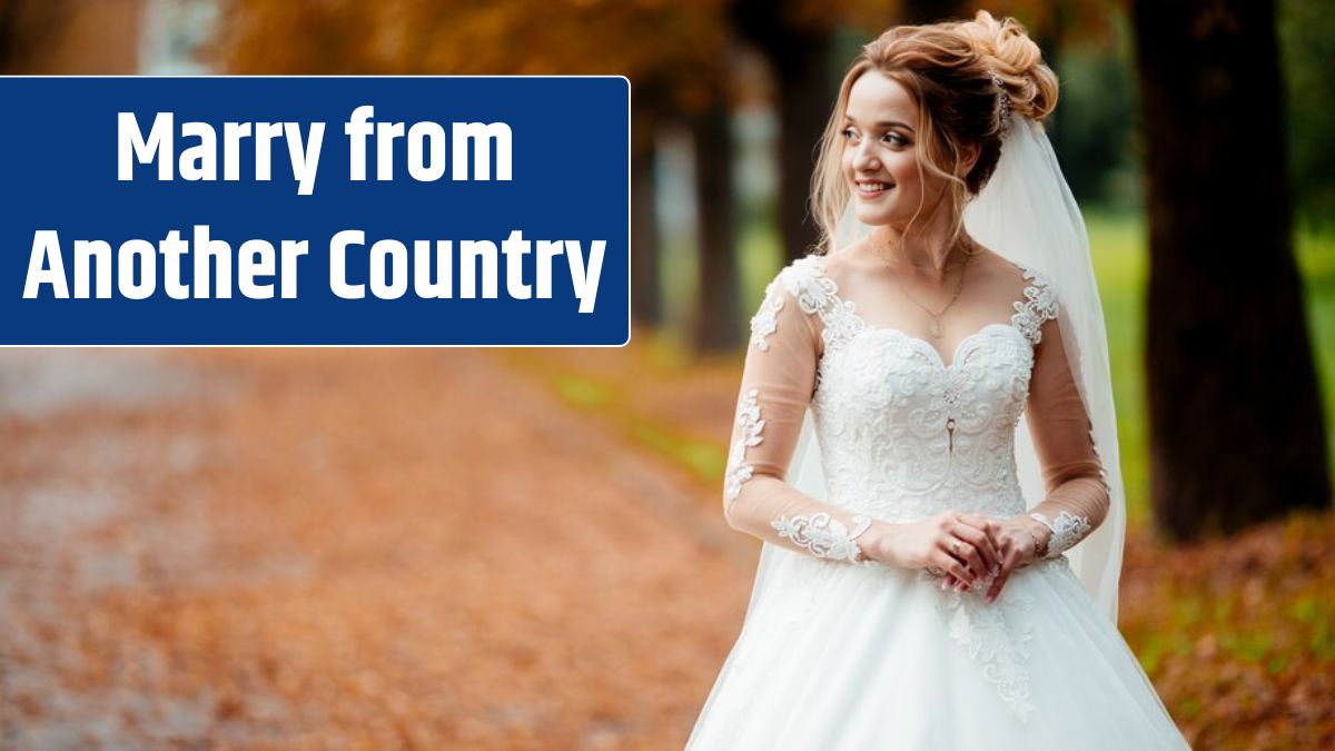 Beautiful bride in fashion wedding dress on natural background.The stunning young bride is incredibly happy.