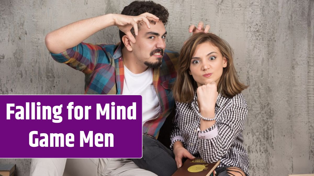 Young couple sitting on the floor with books.