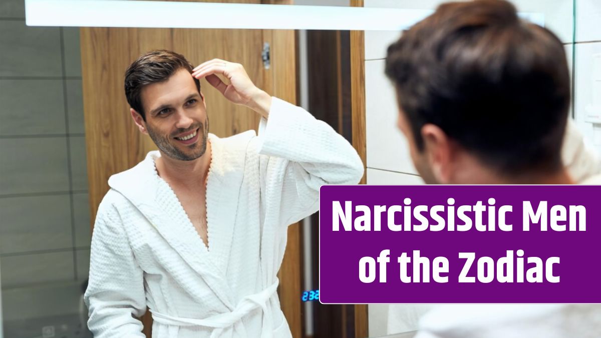 Reflection in a mirror of happy man in bathrobe adjusting his hairstyle.