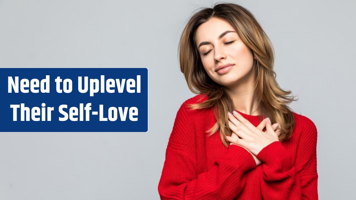 Portrait of a lovely woman dressed in red sweater isolated over gray wall.