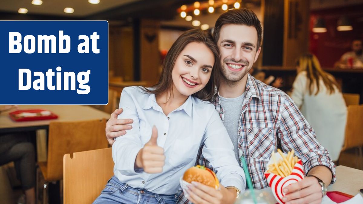 Loving couple having lunch at local fast food..