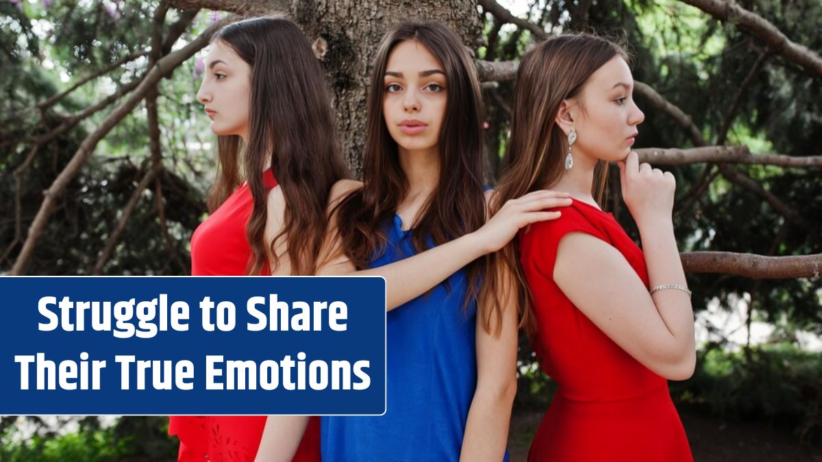 Three teenagers girl in blue and red dresses posed outdoor.