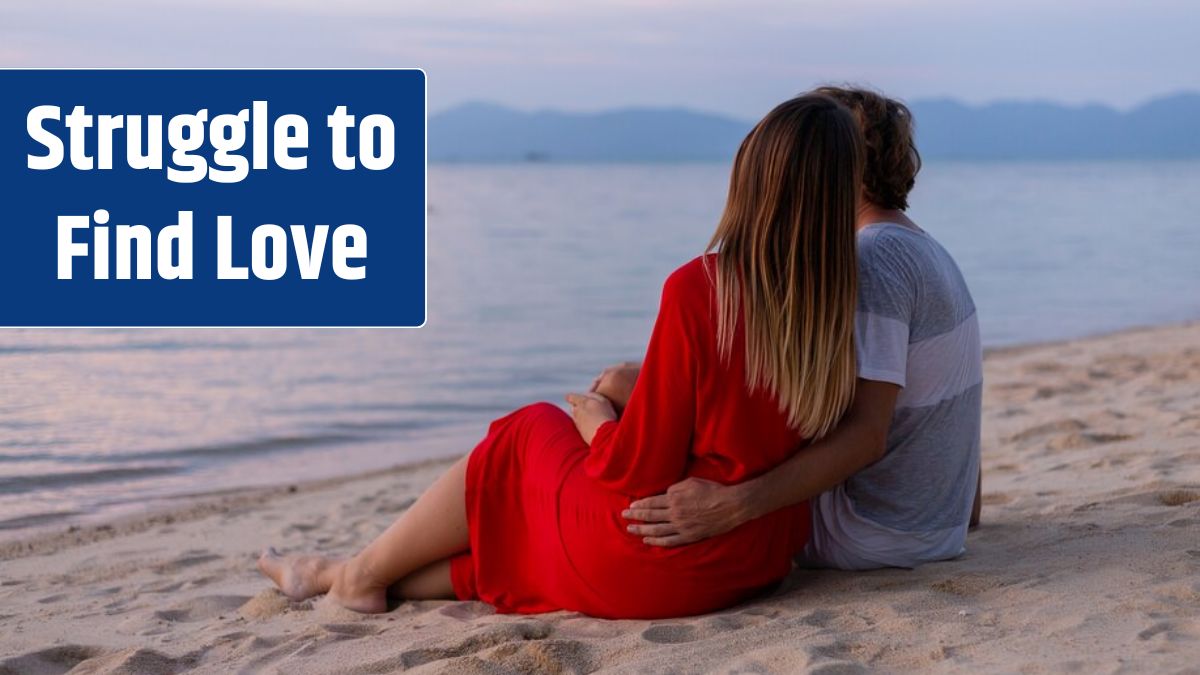 Romantic couple on beach at sunset.